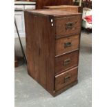 A vintage stained pine four drawer filing unit, the lock plate marked Alfred Brown Birmingham, on