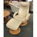 A Norwegian leather and bent plywood reclining swivel chair in a pale cream colourway '