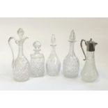 Three cut glass decanters, the tallest 33.5cmH, together with two cut glass pitchers, one with
