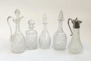 Three cut glass decanters, the tallest 33.5cmH, together with two cut glass pitchers, one with