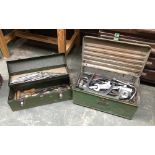 Two vintage green painted tool boxes, containing a quantity of very large spanners, sockets etc