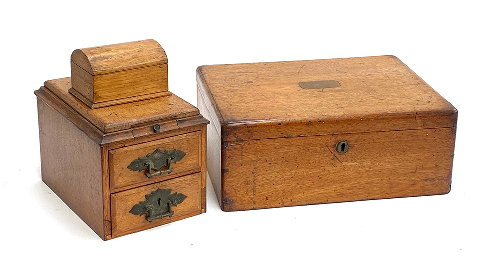 An oak desktop stationery box, associated domed casket, moulded top with stamp drawer, 16cmW;