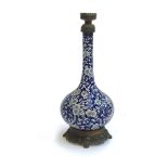 A late 19th/early 20th century Chinese cloisonne enamel vase, prunus design, partially converted for