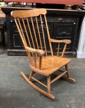 A 20th century beech stick back rocking chair, 60cmW