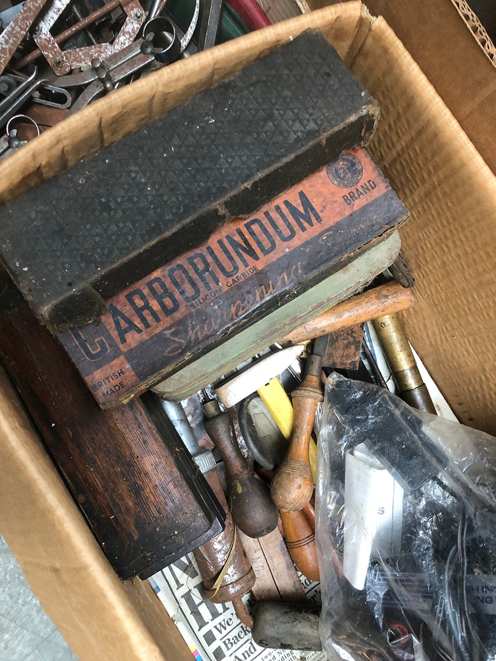 Several boxes of tools comprising various sharpening stones; sockets and spanners; vices etc; - Image 2 of 4