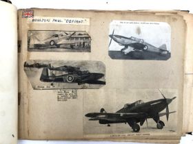 An album relating to WWII aircraft containing a quantity of photos, newspaper clippings, cigarette