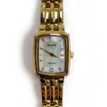 A ladies Accurist wristwatch, gold plated with mother of pearl rectangular dial