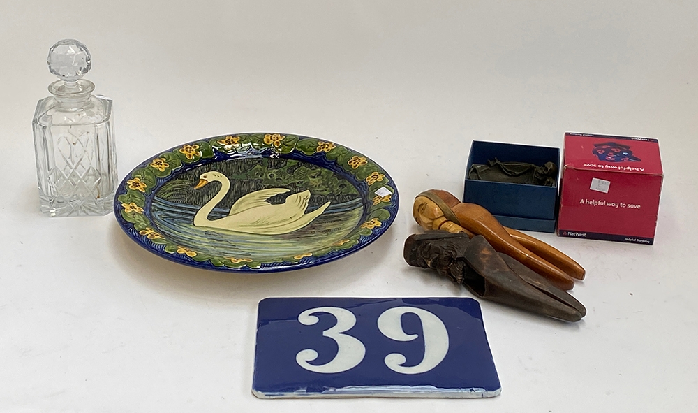 A mixed lot to include no 39 ceramic house number; Majolica charger depicting a swan, two nut