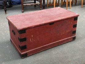 A red painted pine travel trunk with metal bracing, 84x44x39cmH