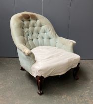 A 19th century button back walnut bedroom chair, in need of reupholstry, 81cmW