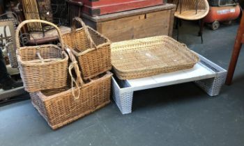 A quantity of wicker baskets, to include a wicker bed tray