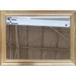 A rectangular gilt framed mirror with bevelled glass, 73x102cm