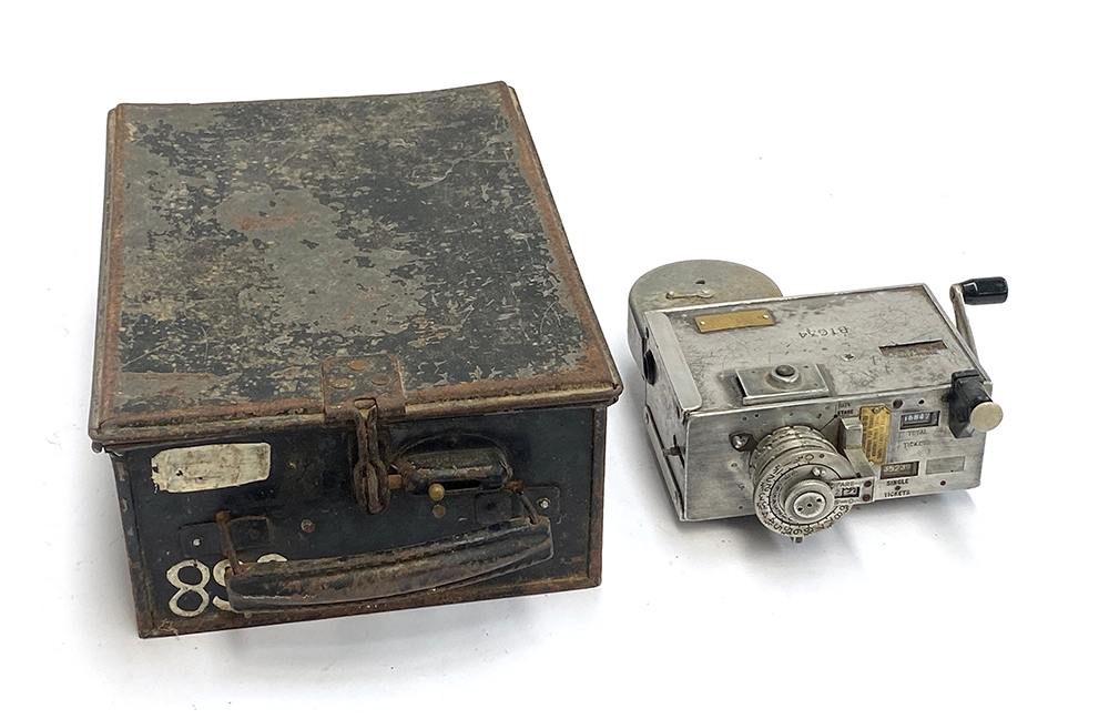 A Setright conductors' ticket machine in black painted metal box, serial no. 33577