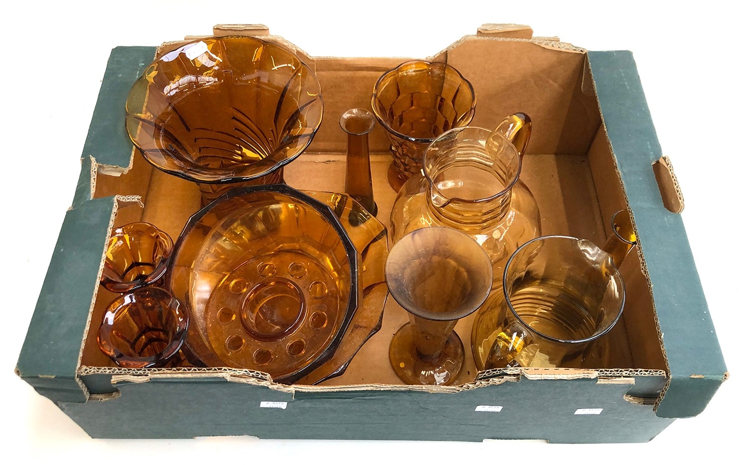 A box of amber glass to include vases and jugs