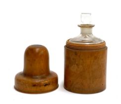 A treen apothecary bottle holder with glass bottle and stopper, 13cmH