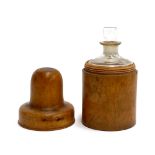 A treen apothecary bottle holder with glass bottle and stopper, 13cmH