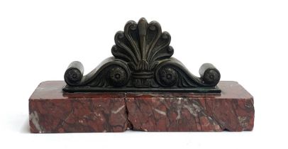 A bronze and marble desk weight with anthemion detail, 15cmW