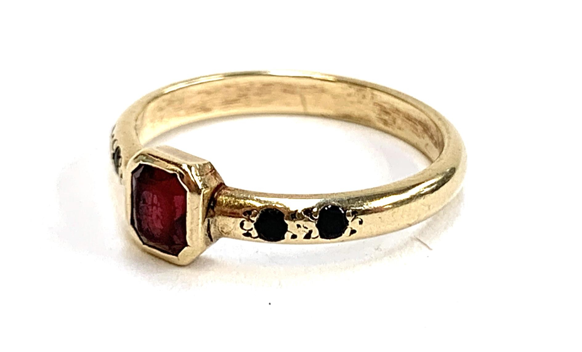 A 9ct gold ring set with an emerald cut garnet, size N, 2.3g - Image 2 of 2