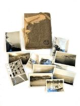 A small photograph album containing 20 photographs. c.1930, mainly equestrian interest, to include