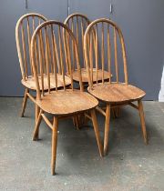 A set of four mid century Ercol style stickback kitchen chairs