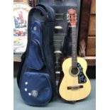 A Kay acoustic guitar, K135, in remix soft carry case