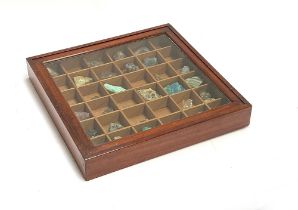A glazed mahogany specimen cabinet containing a quantity of minerals, 38cm square