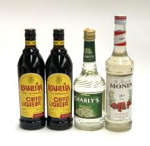 Two bottles of Kahlua (70cl, 16%); one bottle Monin gum syrup, (70cl); together with one bottle