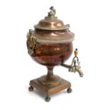 A 19th century copper and brass samovar with dolphin finial and mermaid handles, 37cmH