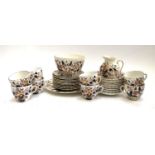 A Royal Crown Derby style Imari part tea service, comprising of teacups, saucers, side plates,