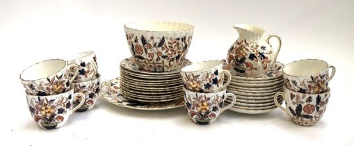 A Royal Crown Derby style Imari part tea service, comprising of teacups, saucers, side plates,