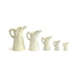 A set of five graduating Royal Worcester banana leaf jugs