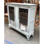 A light blue painted lead glazed bookcase, glass af, 122x34x122cmH