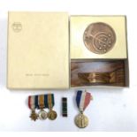 A set of 3 miniature medals comprising 1914-15 star, victory and war medals, together with an Edward