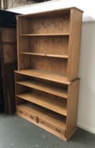Two pine bookcases, 130x33x112cmH and 140x41x103cmH (2)
