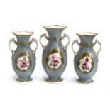 A set of three late 19th/early 20th century twin handled vases, grey ground with central hand
