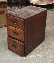 A mahogany pedestal of three drawers, with campaign handles, 31x51x51cmH