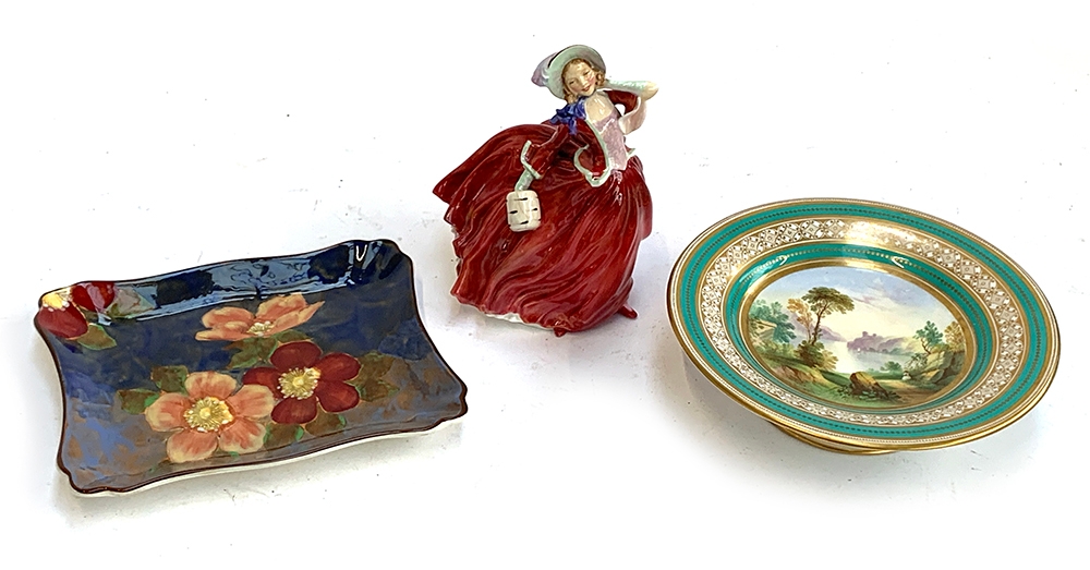 A Royal Doulton 'Autumn Breezes' lady figurine; Royal Doulton floral square dish; and hand painted