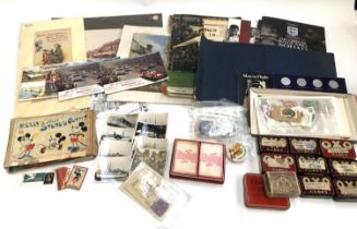 A mixed lot to include oxo tins, matchboxes, meccano booklets, HMS photos, soccer stars trade cards,
