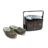 A Chinese lacquered lunchbox with porcelain fragment lid, together with a pair of Eastern slippers