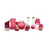 A collection of cranberry glass to include a pair of vases with silver collars; Brandon Fair 1909