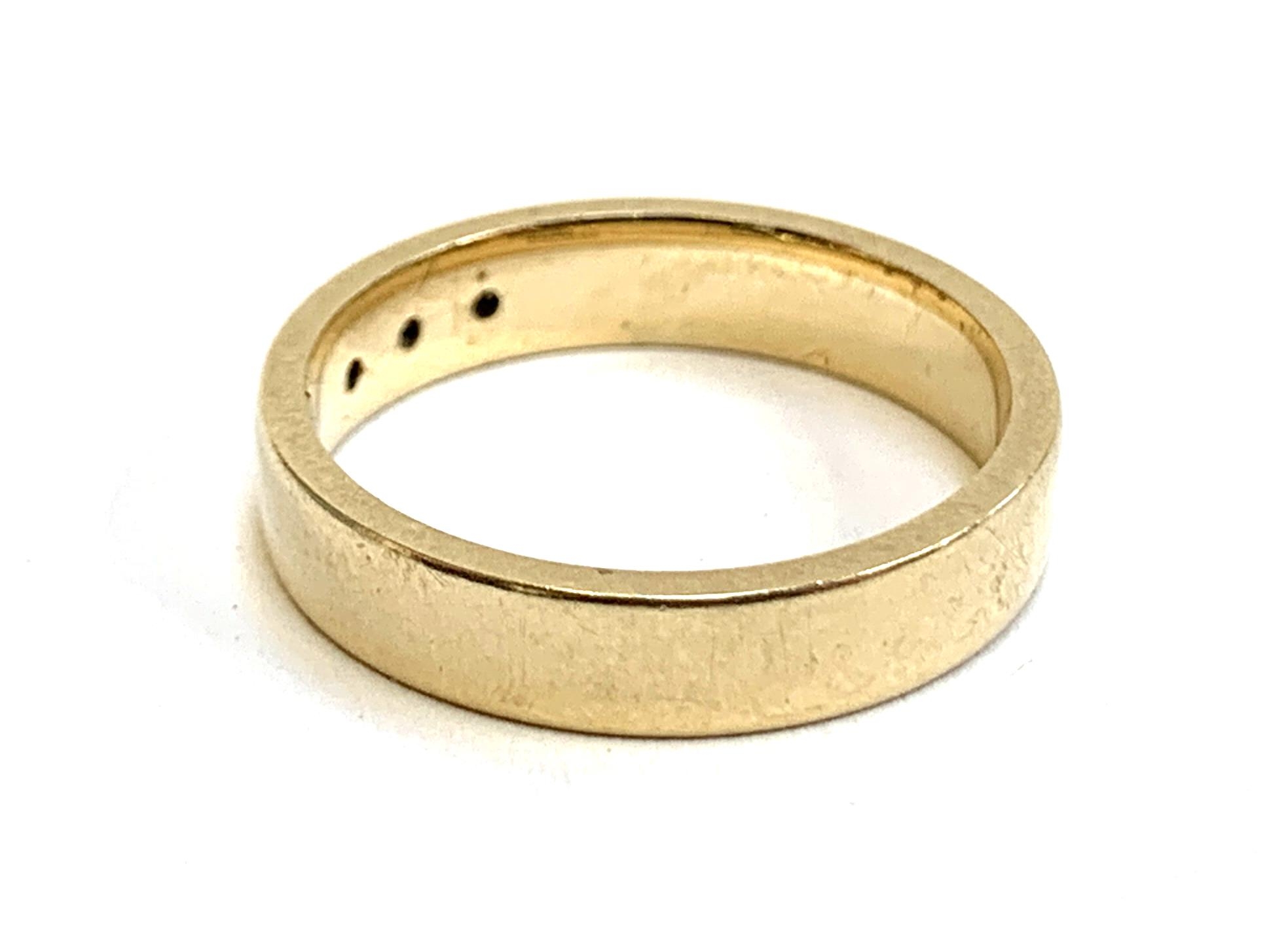 A 9ct gold band gypsy set with three small diamonds, size M, 3.4g - Image 2 of 2
