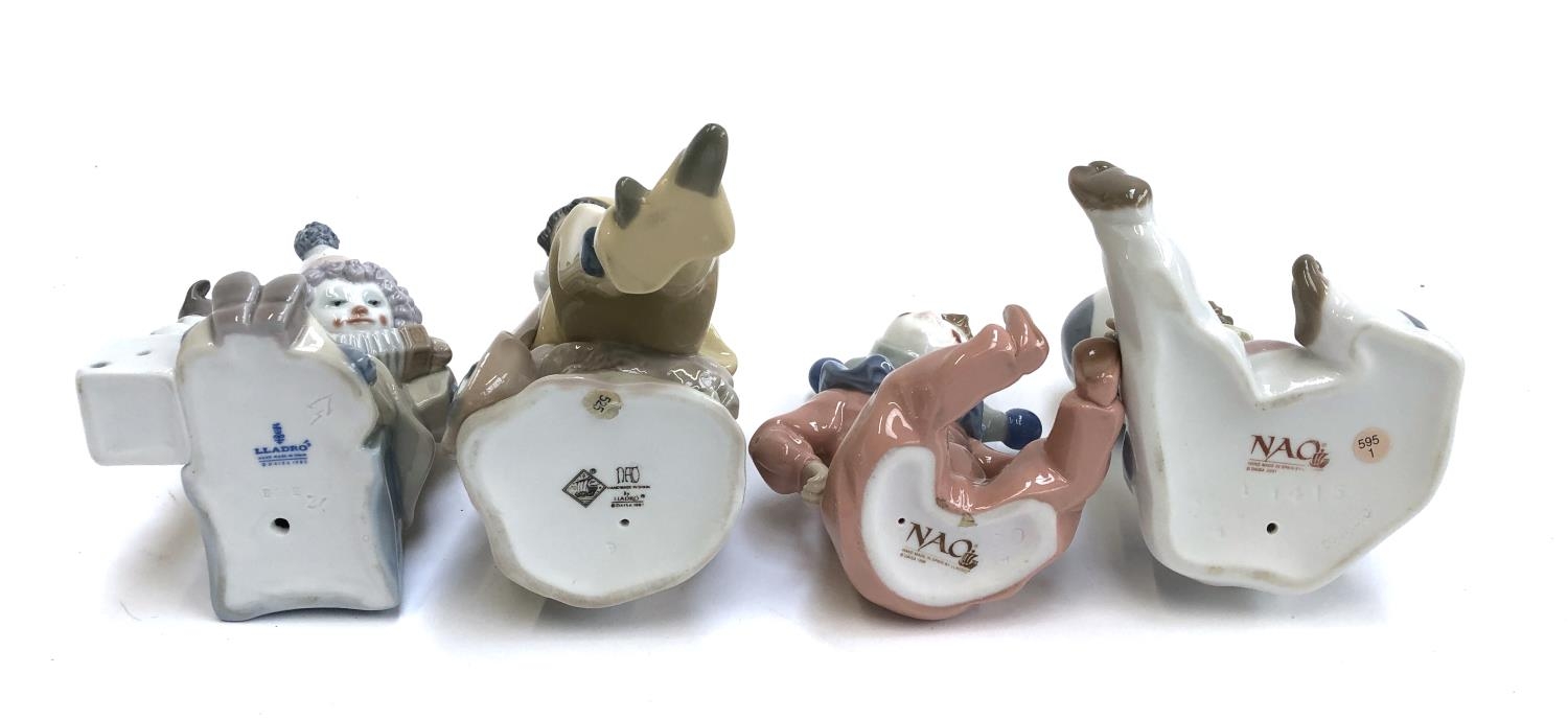 Four Lladro figurines, three stamped Nao, to include child dressed as cow, no. 1415, child dressed - Image 2 of 2