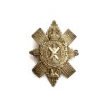 Scottish military interest: A Black Watch Royal Highlanders cap badge, bearing motto 'Nemo Me Impune