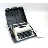A Carina typewriter in hard carry case