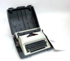 A Carina typewriter in hard carry case