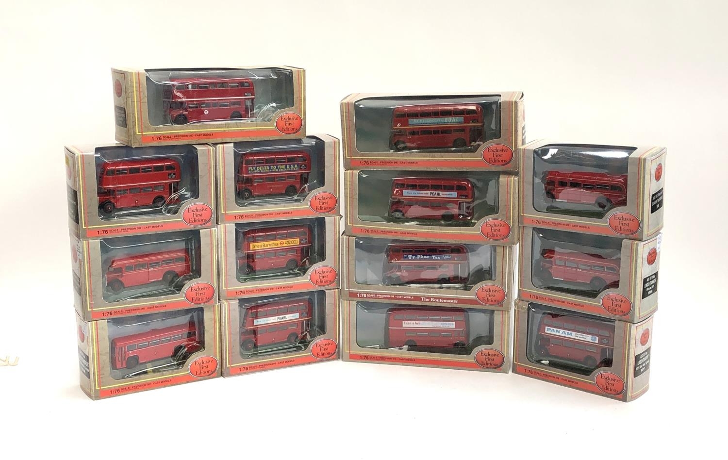 Fourteen Exclusive First Editions 1:76 scale London Transport double and single decker buses, in red