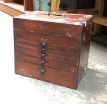 A C. Ash & Sons London mahogany specimen chest containing a quantity of engineers tools, mostly