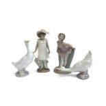 Four Nao by Lladro figures, comprising two white geese, girl with umbrella, no. 1126, and ballerina,