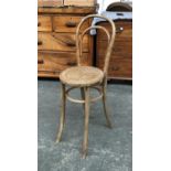 A Thonet style child's correction chair with caned seat, 58cmH