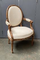 A carved and upholstered open armchair in Louis XV taste, 59cmW
